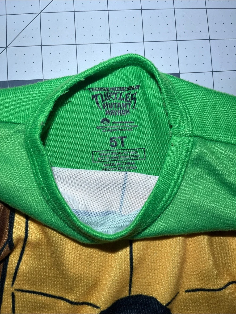 Kids Green Turtle Shell Pajama Top with Orange Sleeve Accents